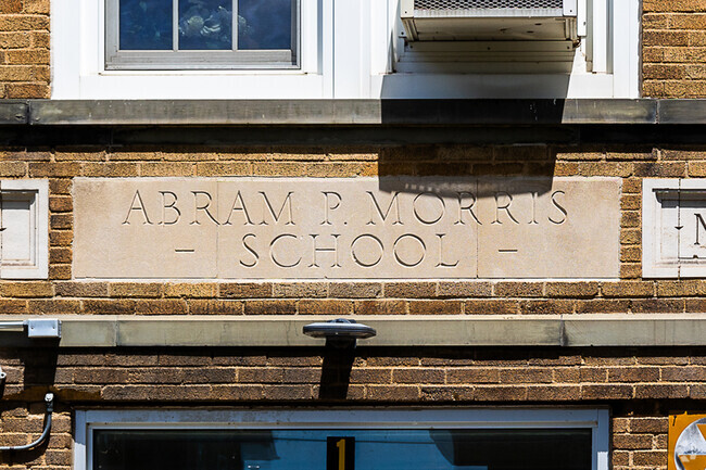 Abram P Morris School is in a large suburban setting.