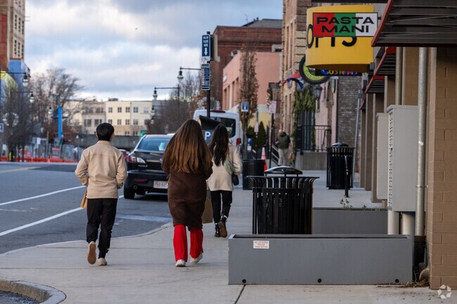 Locals are found walking outside of Worcester Public Market.