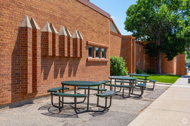 Green Gables Elementary School's red-brick exterior stands out among the lush green of Carmody.