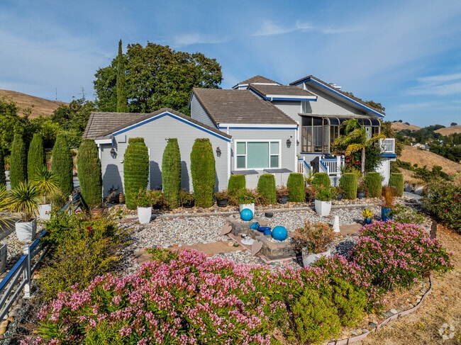 Contemporary homes decorate the hills in Pinole Valley.