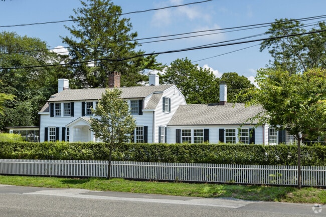 Many of the historic homes in the Historic District of Bellport, NY are fenced in.