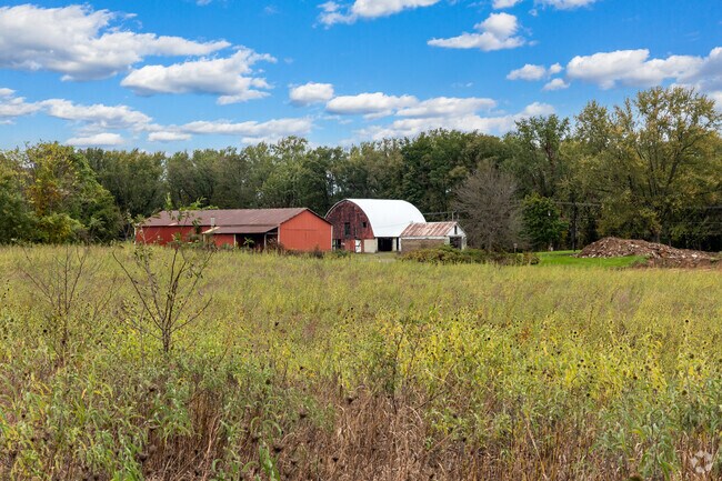 Rustic farm buildings can be scene at the Robert Porter Allen Natural Area, near Armstrong.