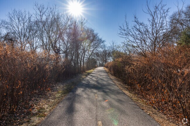 Enjoy serene views while biking the Blackstone River Bikeway in Thompson Hill.