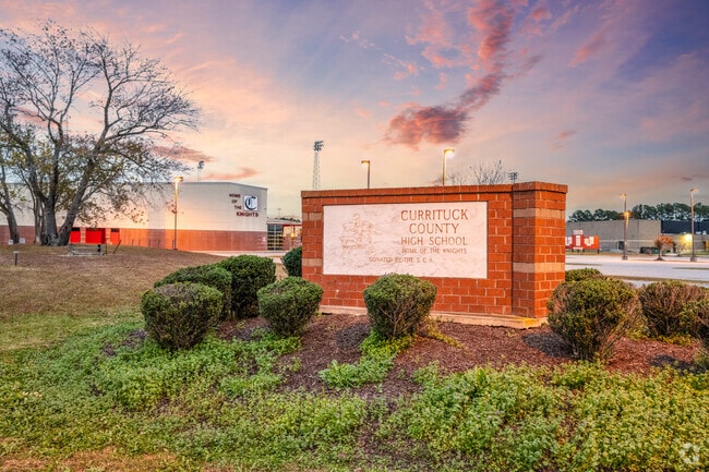 Currituck County High School's colors are red, black and white, and are home to the Knights.