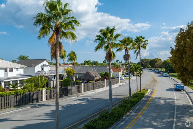 Single-family homes line streets near Lago Mar Park in Kendale Lakes West.