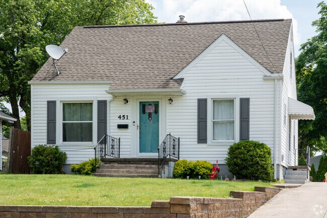 Cape Cod homes line the streets of the Goodyear Heights neighborhood.