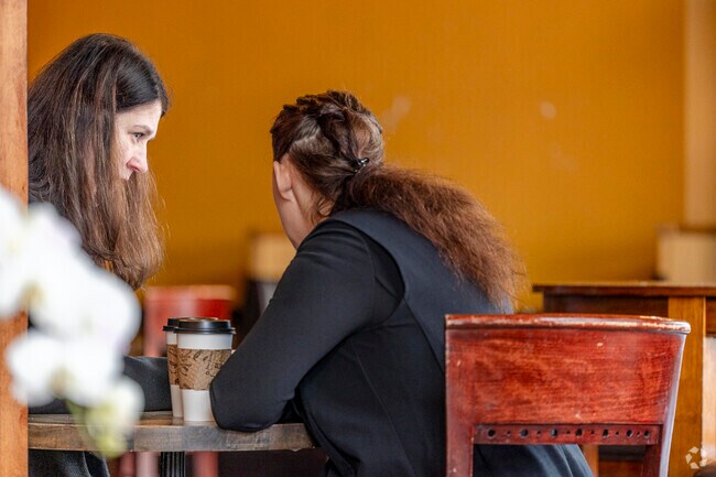 Folks enjoying a pick me up at Jewel Box Cafe in Ruston WA.
