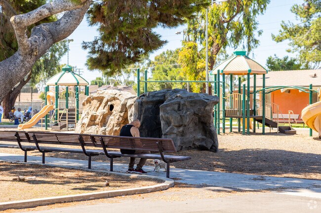 Take your dog for a walk through Roy Campanella Park in West Compton, CA.