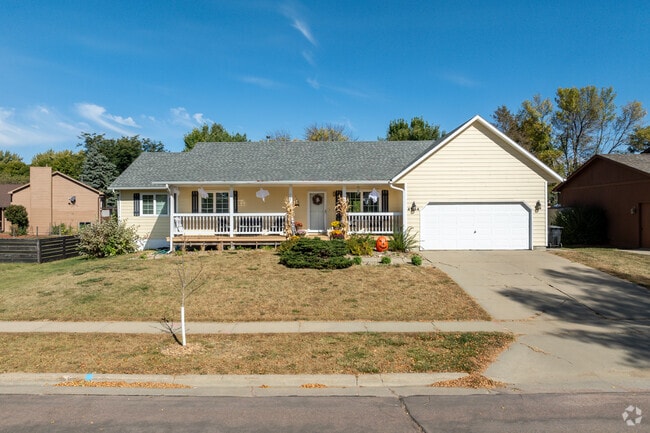Many ranch-style homes welcome visitors with large front porches.