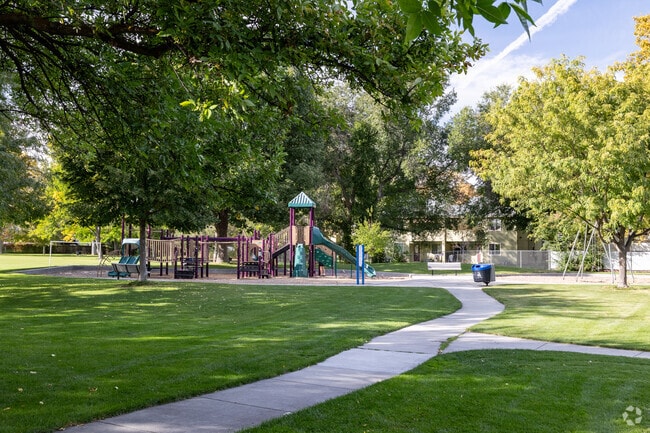 Walking paths lead to the playground at Shoshone Park in Vista.