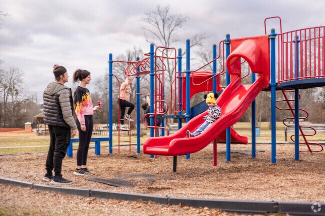 Families love spending time at the playground at Jack Benson Heritage Park in Hamilton Place.