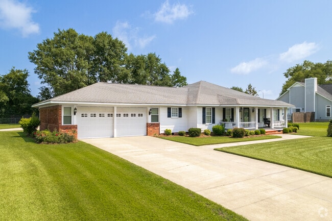 The new traditional homes have modern design elements in Palmetto Park.