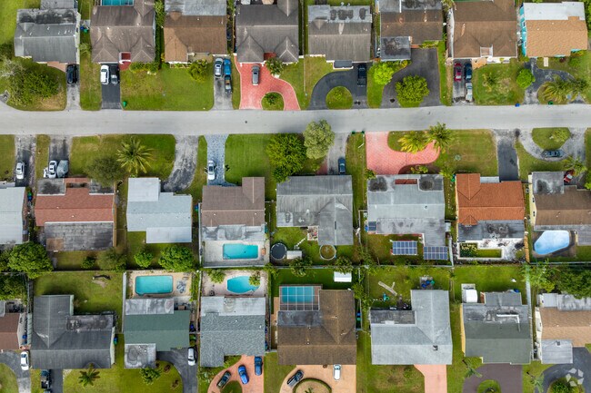 A 90 degree look down view of a typical row of homes from above.