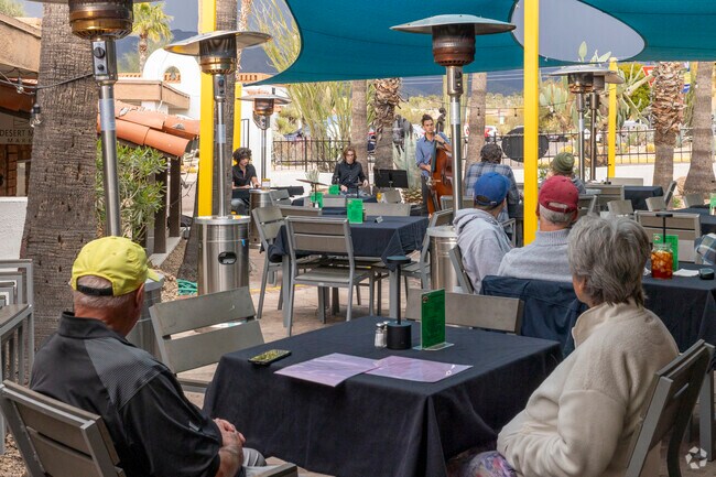 Enjoy outdoor dining and live music on the weekends in Pinnacle Peak.