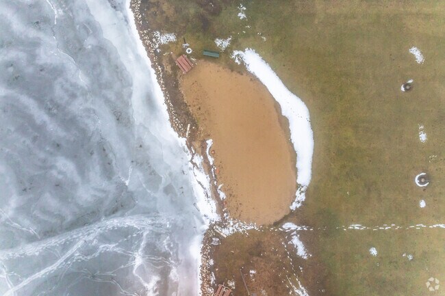 There is a small sandy beach at Lookout Point Park and Boat Launch.