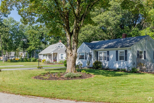 Gracious trees line the streets of the Barrington neighborhood, this row of homes is exemplary.