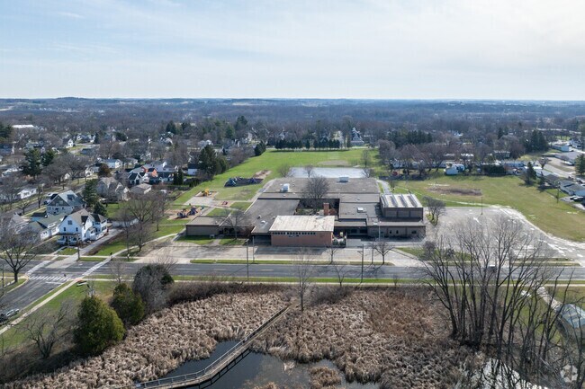 There is a wetlands adjacent to Purdy Elementary School.