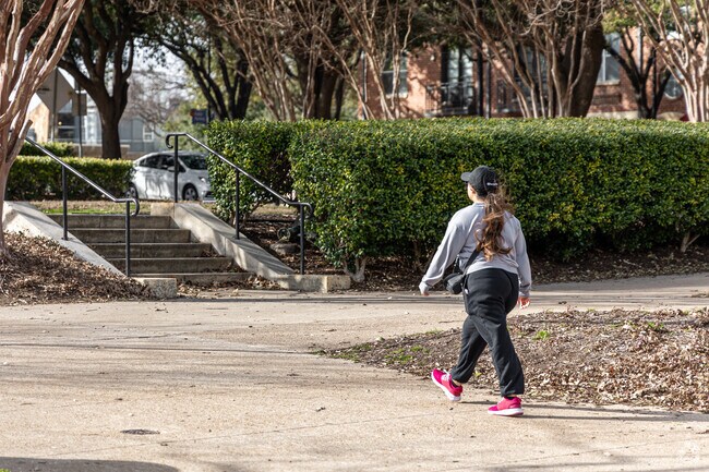 Walking in Addison Circle Park is a popular way for Addison residents to enjoy the fresh air.