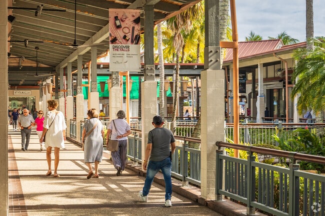Residents of Kendall, FL, enjoy a nice shaded walk at the open air mall of The Falls.