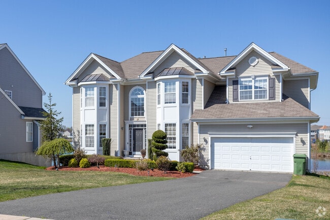 Houses with large front lawns create curb appeal.