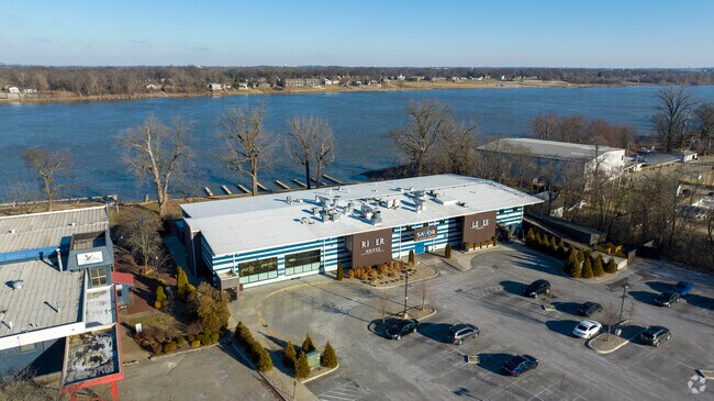 River House Restaurant and Raw Bar is just outside of Indian Hills  but has outstanding reviews.