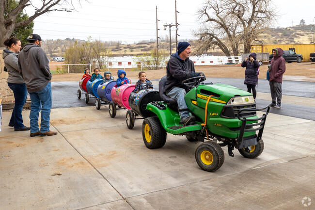 Get a ride on a tractor train at the Touch-A-Truck event.