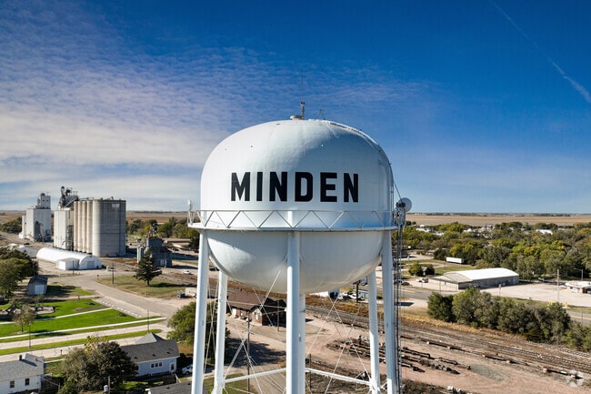 Minden’s water tower rises over grain elevators and neighborhood streets.