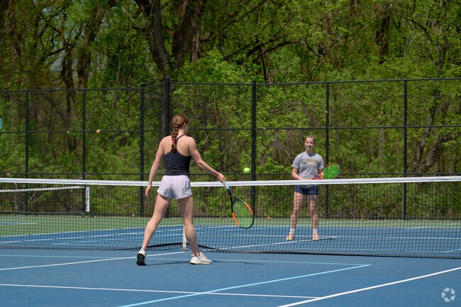 Residents enjoy a game of tennis at Potomac Regional Overlook Park near Rock Spring.