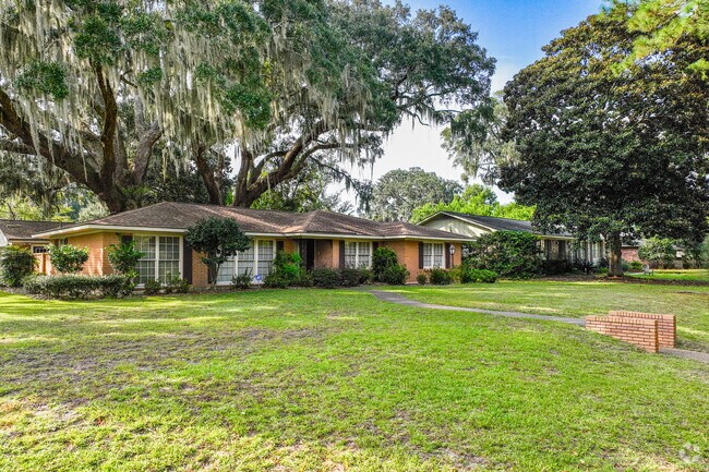 Homes of Mayfair share the lots with historic, live oak trees.