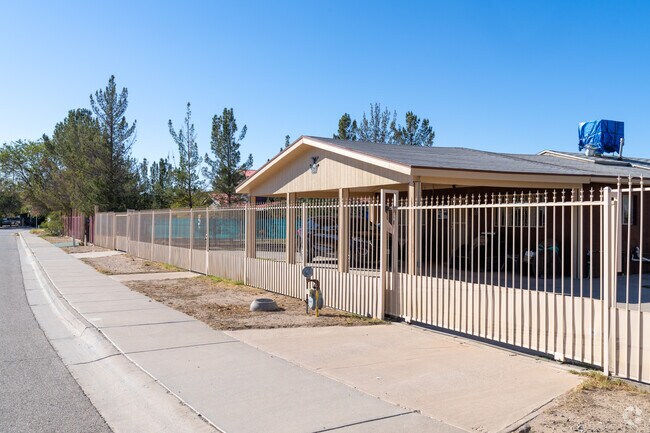 In San Elizario, some homes feature carports to shelter from the elements.