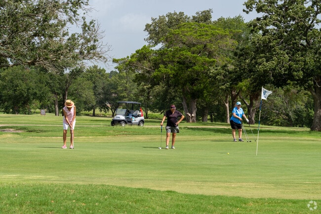 Local enjoy a round of golf at Phillips Event Center  in Briarcrest.