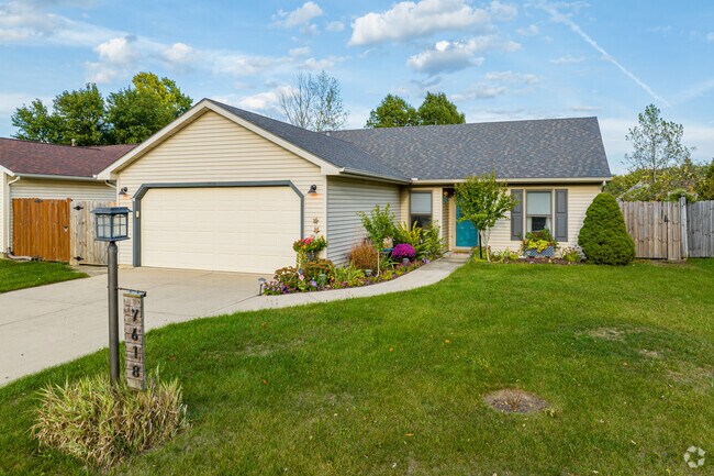Wooden fences keep your furry friends secure in Auburn Farms.