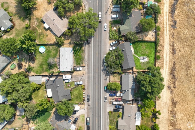 Tree-lined streets and open spaces highlight White City’s balance between neighborhood living and rural charm.