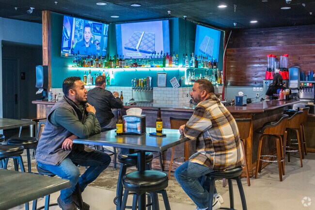 Locked In Sports Bar is a favorite place to relax with a cold drink in the Fig Garden Loop.