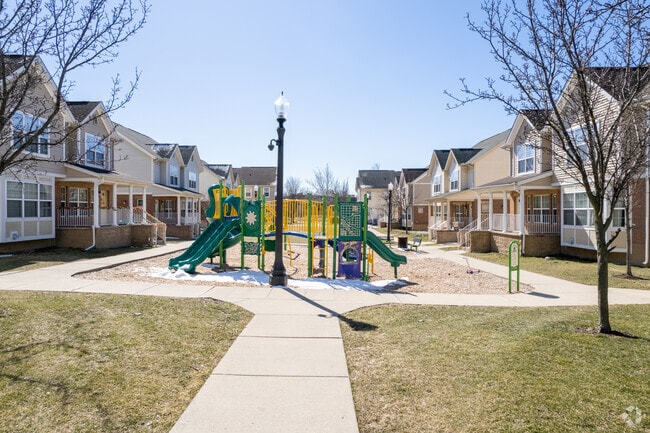 Many townhome complexes in Gardenview Estates enjoy a shared playground at the center of the community — perfect for kids to play just steps from home.