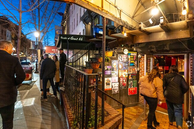 Don't Tell Mama is a piano bar serving American fare in Hell's Kitchen.