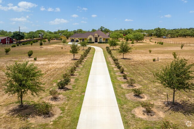 Long private driveways are common for homes of Somerset.