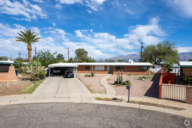 Wide, ranch-style red brick homes are mixed in with other 1970's home styles in Dietz.
