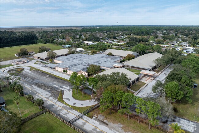 The bus loop is located on the west side of Hans Christian Andersen Elementary School.