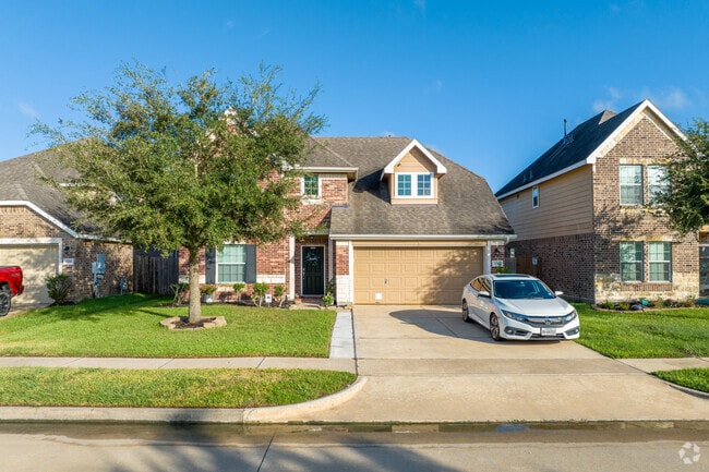 Local residents of Alvin show pride in their neighborhood with well-kept lawns.