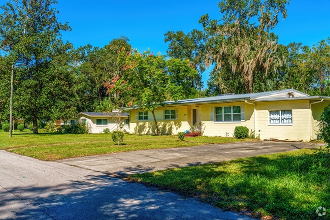 A row of ranch-style homes features well-manicured lawns in Sugarfoot.