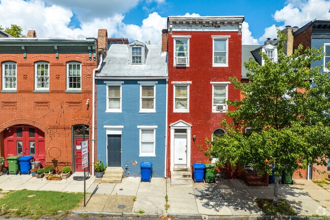 Hollins Market row homes have their own character.