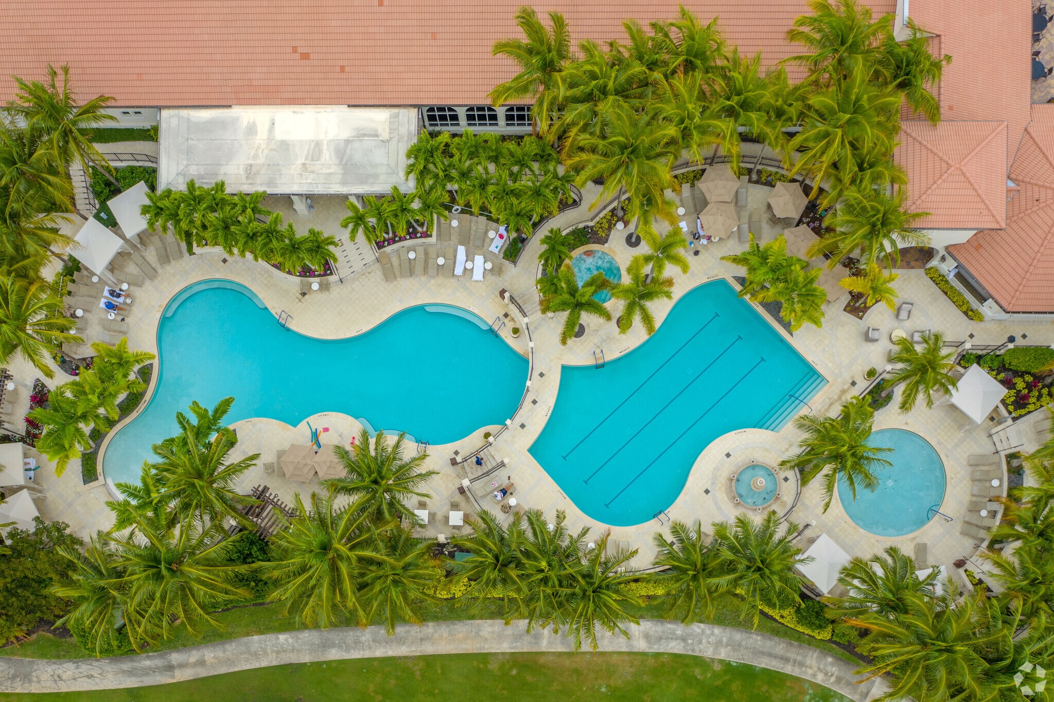 People enjoy the Florida weather by the pool in Aberdeen at the clubhouse.