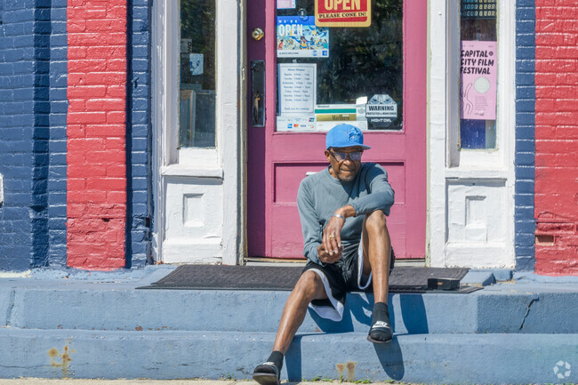 A local resident takes a break at an Old Town store near Turner-Dodge.