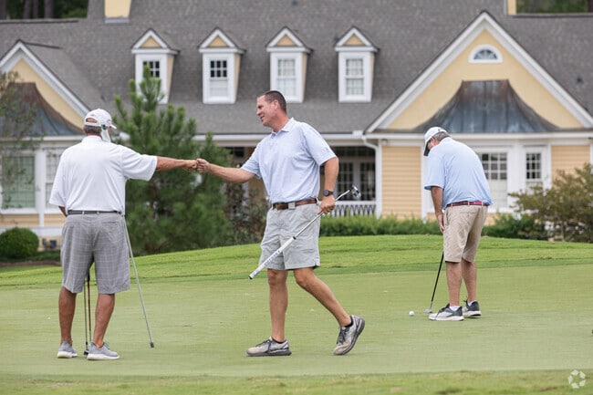 Saint Andrews neighbors enjoy playing golf together.