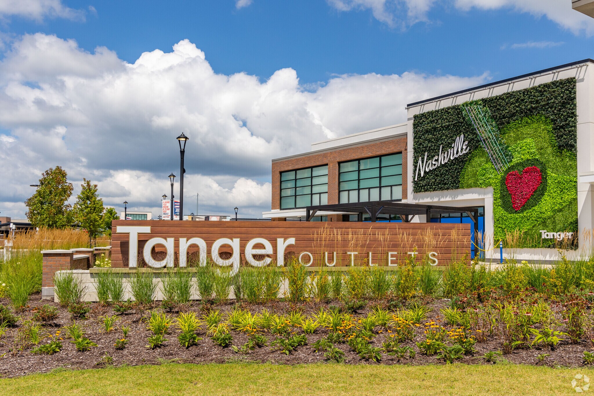 Tanger Outlets offers a premier shopping experience near Summerfield Village.