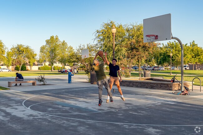 Enjoy a pickup game of basketball and shoot some hoops on the courts at Greystone Park.