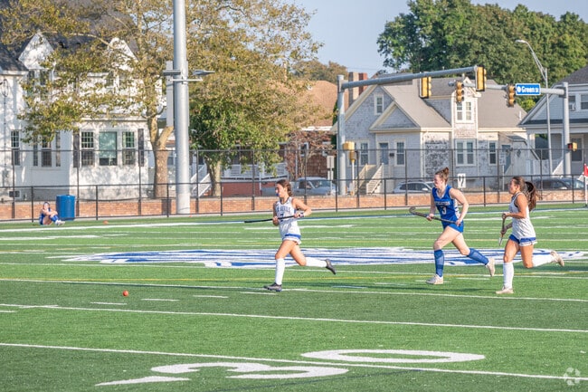 Cheer for the home team at Alumni Stadium in North Fairhaven, MA.
