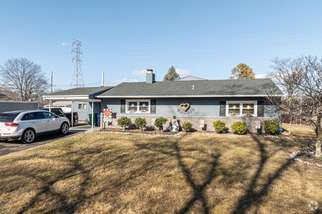 Oaktree Hollow features single-family homes on small to medium-sized lots such as this modest, ranch-style home.