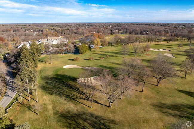 Adjacent golf course views illustrate why River Edge feels so serene — the neighborhood sits near expansive green spaces that create natural buffers and scenic surroundings.